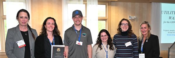 The BLUE team accepting the GMWEA award